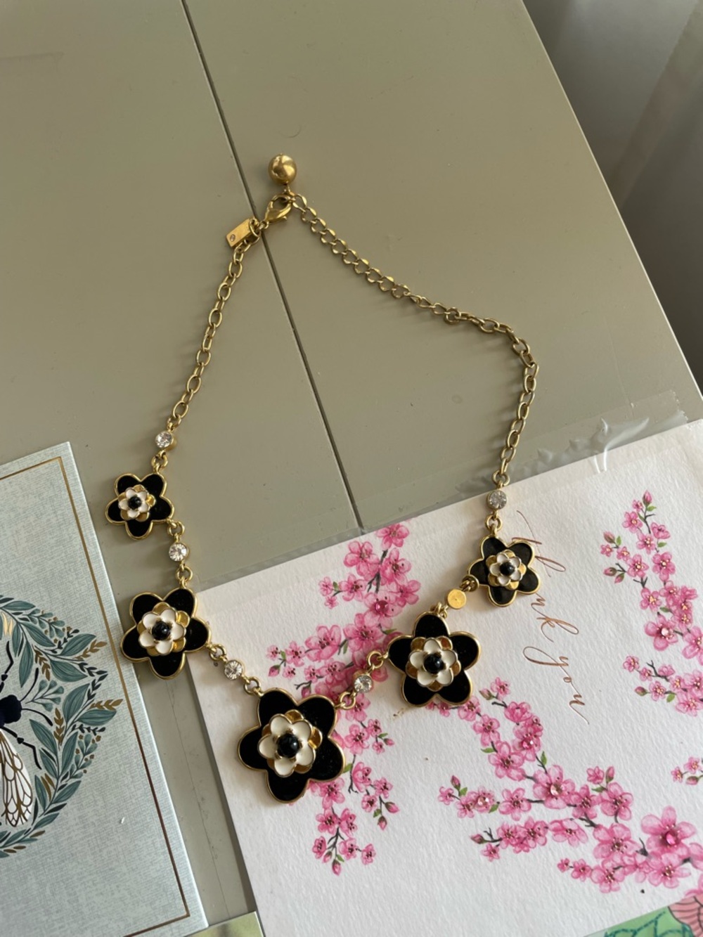 kate spade Gold-Tone Black & White Floral Enamel Necklace
